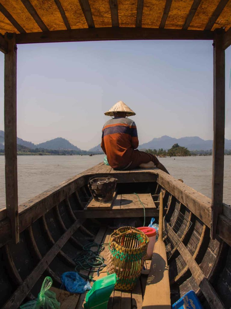 man on a boat in south east asia